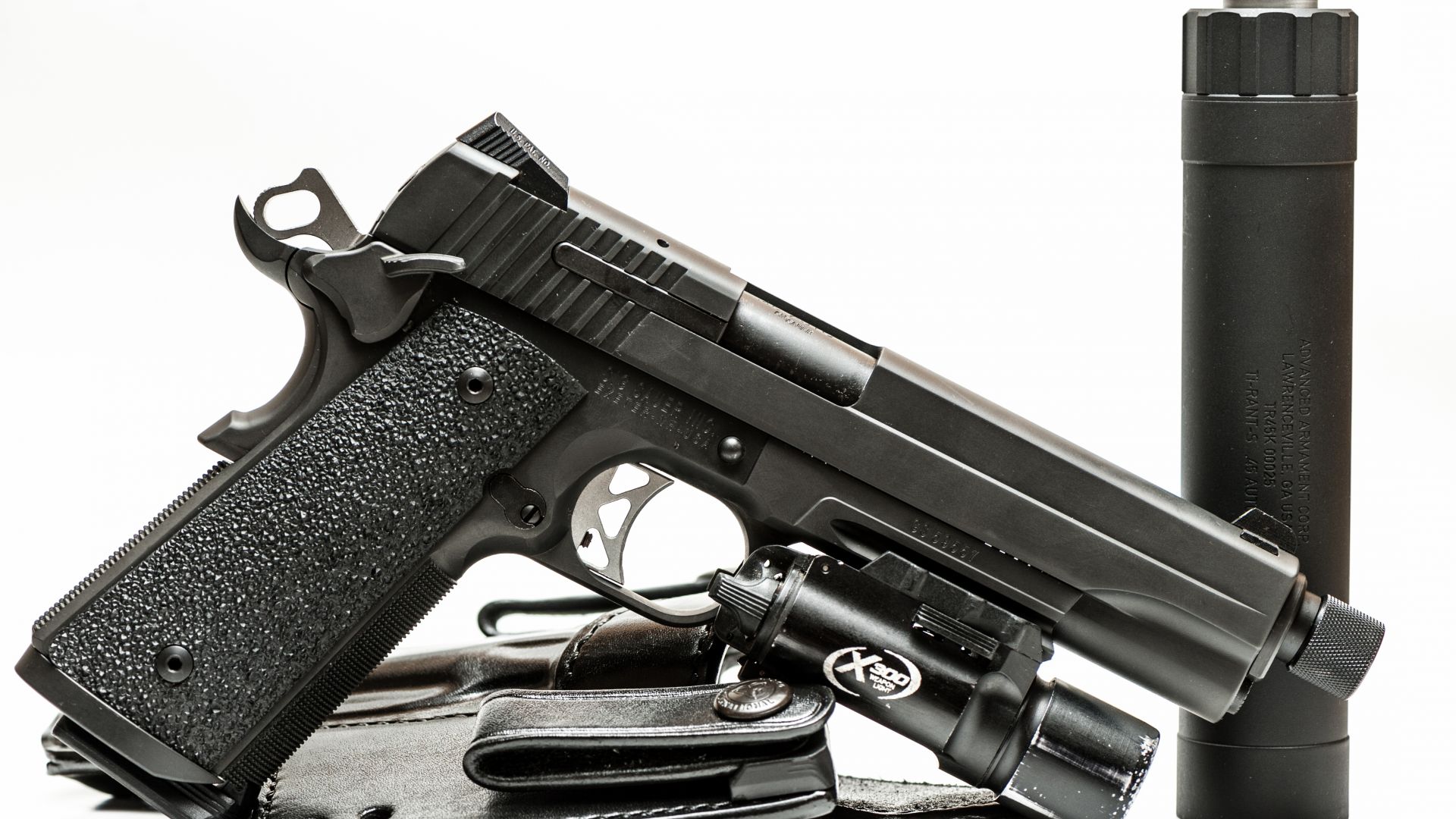 SIG Sauer P226, black, silencer, Germany (horizontal)