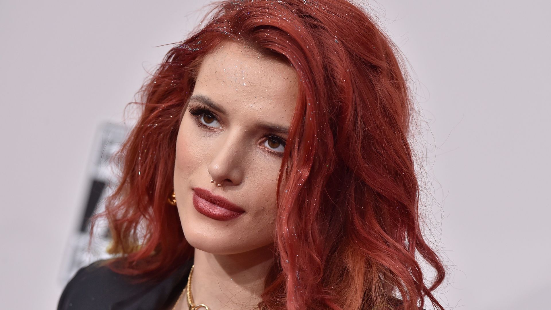 Bella Thorne, Actress, red hair, pink dress, bed, flowers, book (horizontal)