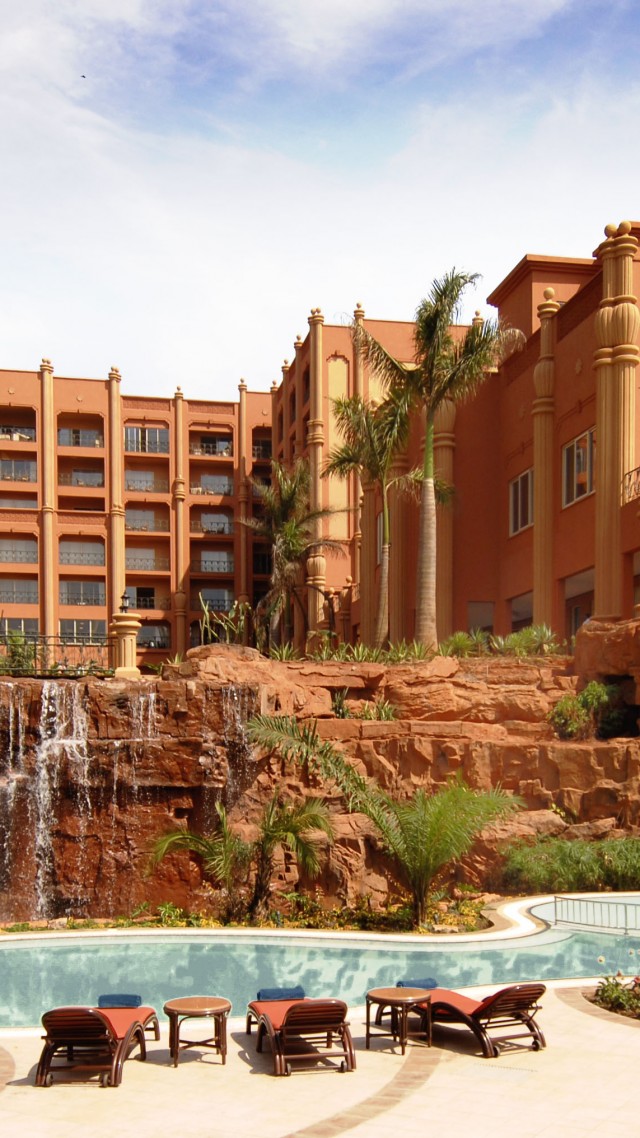 Kampala Serena, Uganda, Hotel, resort, pool, water, sunbed, waterfall, orange, travel, vacation, booking (vertical)