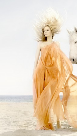 Katia Elizarova, model, blonde, horse, beach, yellow, sand, sea, wind (vertical)