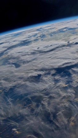 Earth, clouds, 4K (vertical)