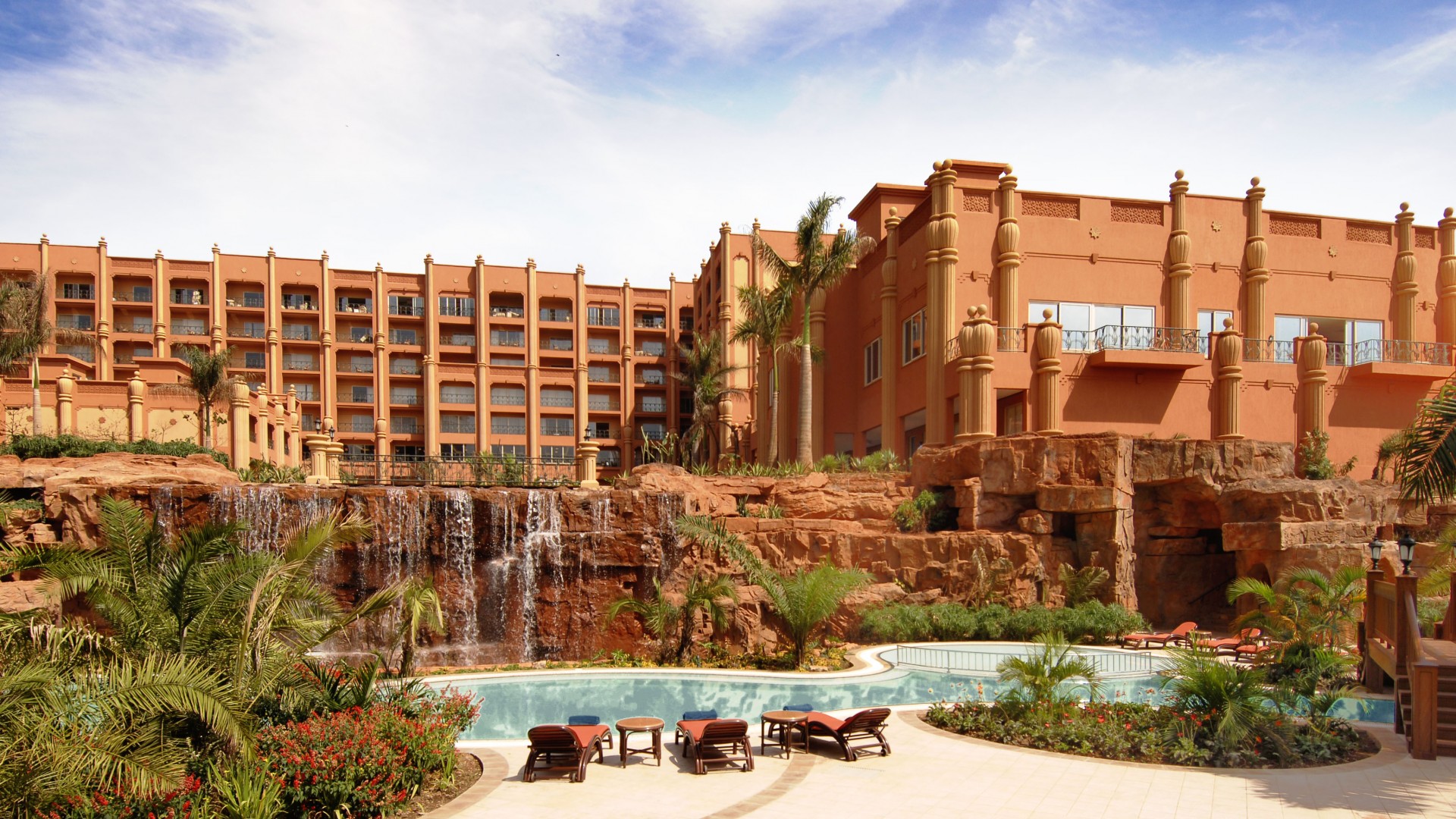 Kampala Serena, Uganda, Hotel, resort, pool, water, sunbed, waterfall, orange, travel, vacation, booking (horizontal)