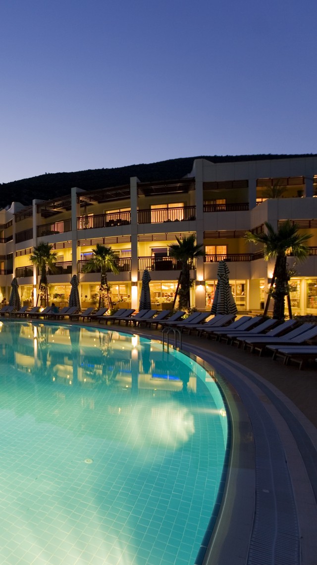 Latanya Bodrum Beach Resort, Turkey, hotel, pool, twilight, light, sunbed, travel, vacation, booking, resort, reflection (vertical)