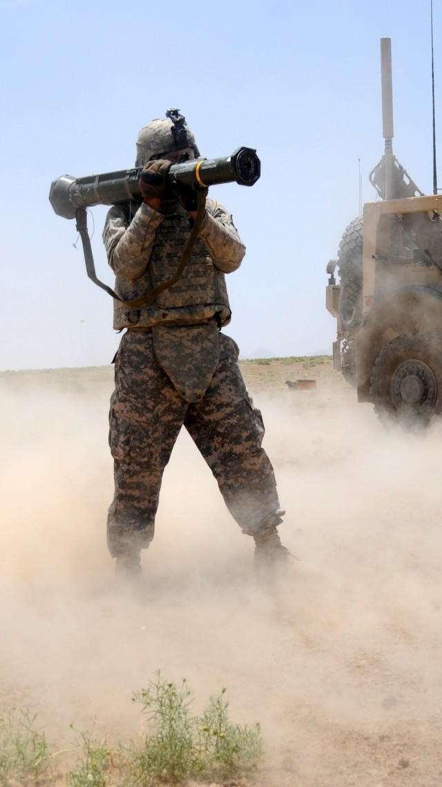 rocket launcher, soldier, firing, AAV, APC, AFV, vehicle, sand, desert (vertical)