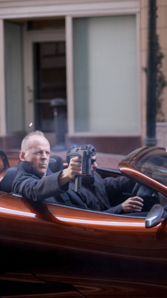 Bruce Willis, Looper, Most Popular Celebs in 2015, actor, car, gun (vertical)
